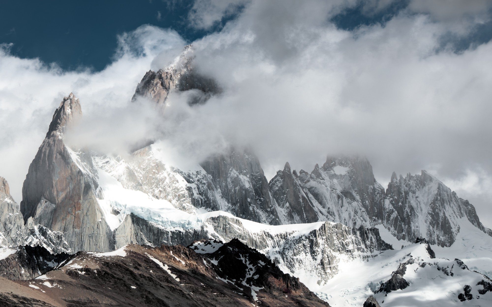 Granite peaks breaking through cloud, Patagonia